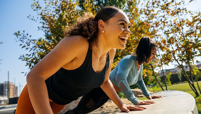 Two women working out Two women working out